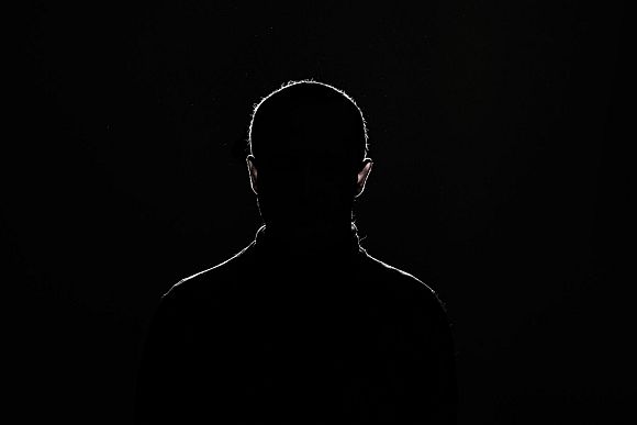 silhouette: guy on black background